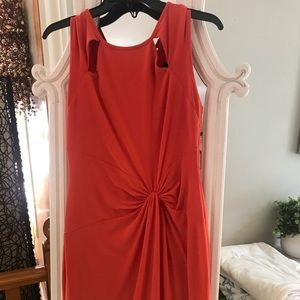 Orange lined knot cutout dress by Lucian Matis